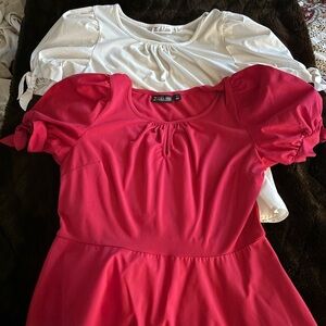 2 New York & Co cute peplum tops. Both tops sold together.